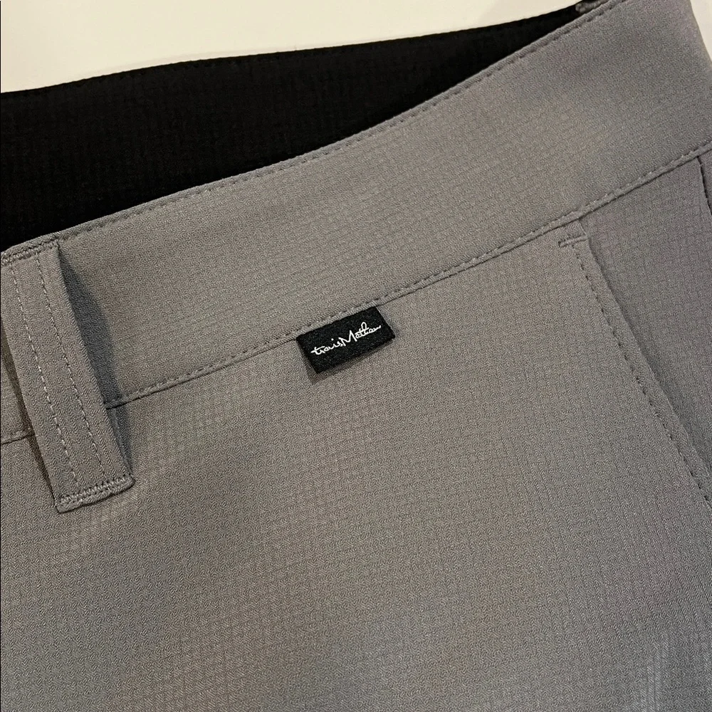Travis Mathew - 38, light weight gray flat front‎ shorts